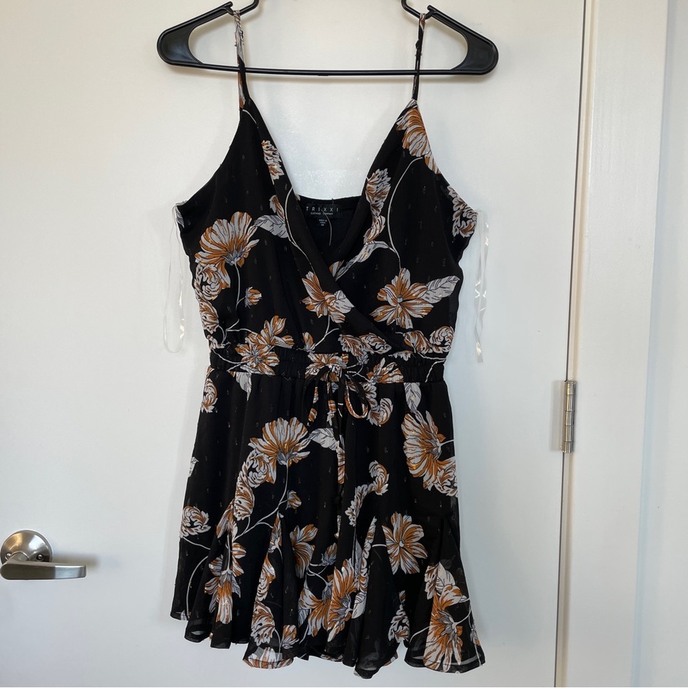 Francesca’s Black Romper with Orange Floral Pattern